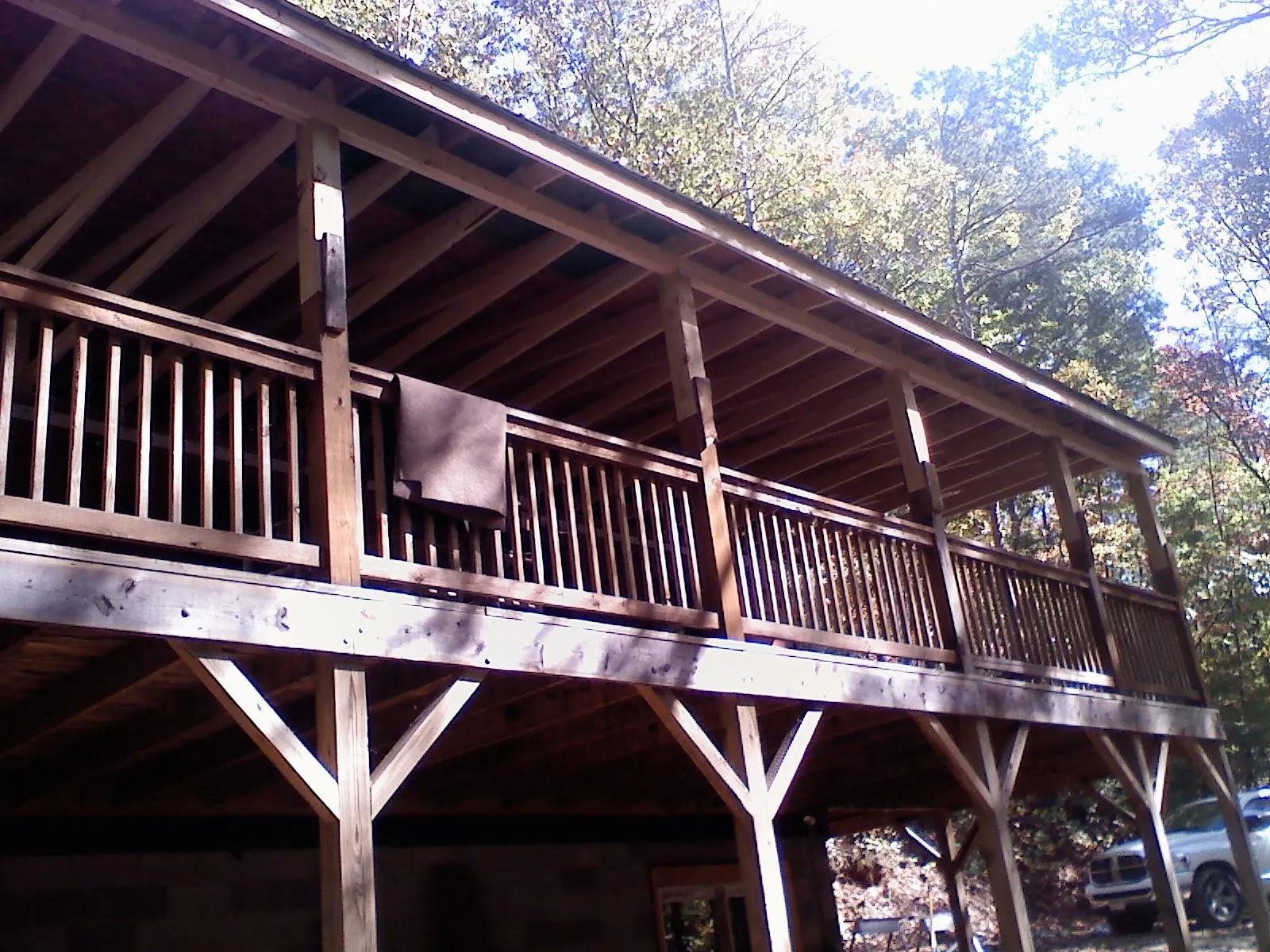 Timber framing under a new elevated porch and deck — Roof Leak Repair in York Harbor by Roofing Brothers